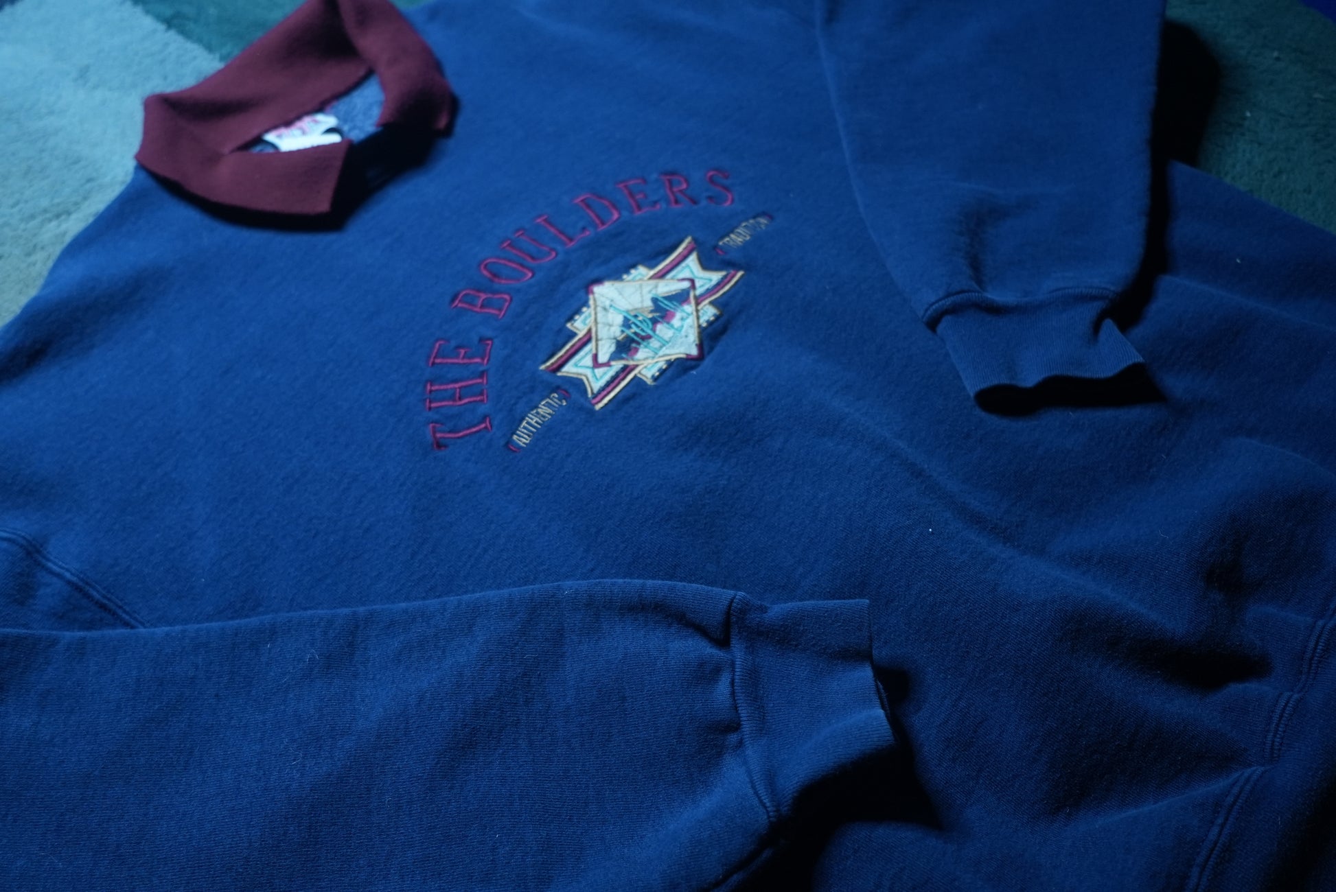 Side view of The Boulders Authentic Edition crewneck sweater in size XL

