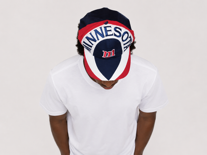 Top down view of a vintage 90s Minnesota Twins MLB baseball snapback hat with embroidered graphic brim
