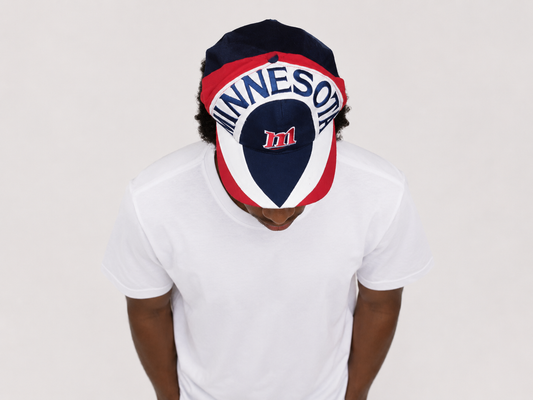 Top down view of a vintage 90s Minnesota Twins MLB baseball snapback hat with embroidered graphic brim
