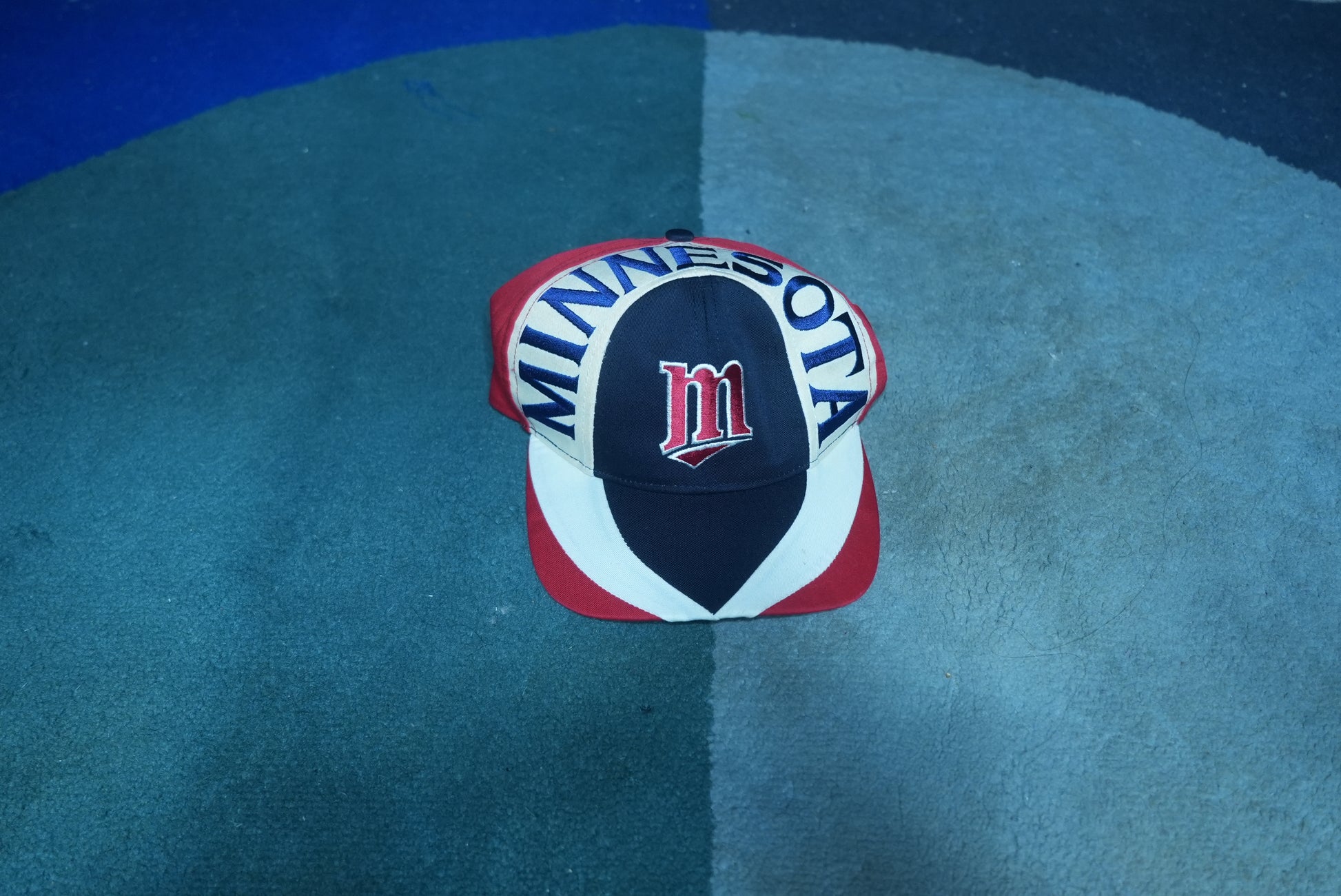 front view of a vintage 90s Minnesota Twins MLB baseball snapback hat with embroidered graphic brim
